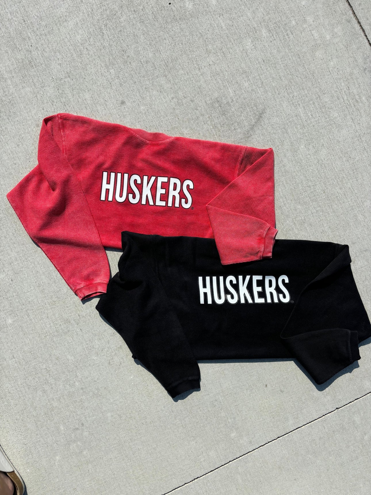 Nebraska Cornhuskers game day tops collection, featuring tees and hoodies in team colors for dedicated fans