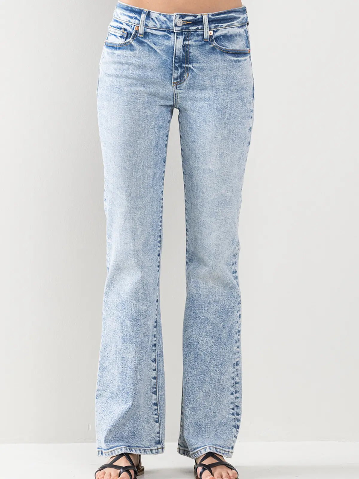 stock image of Hawthorne light acid wash boot cut jeans, mid-rise, hole-free design, worn by model in true size