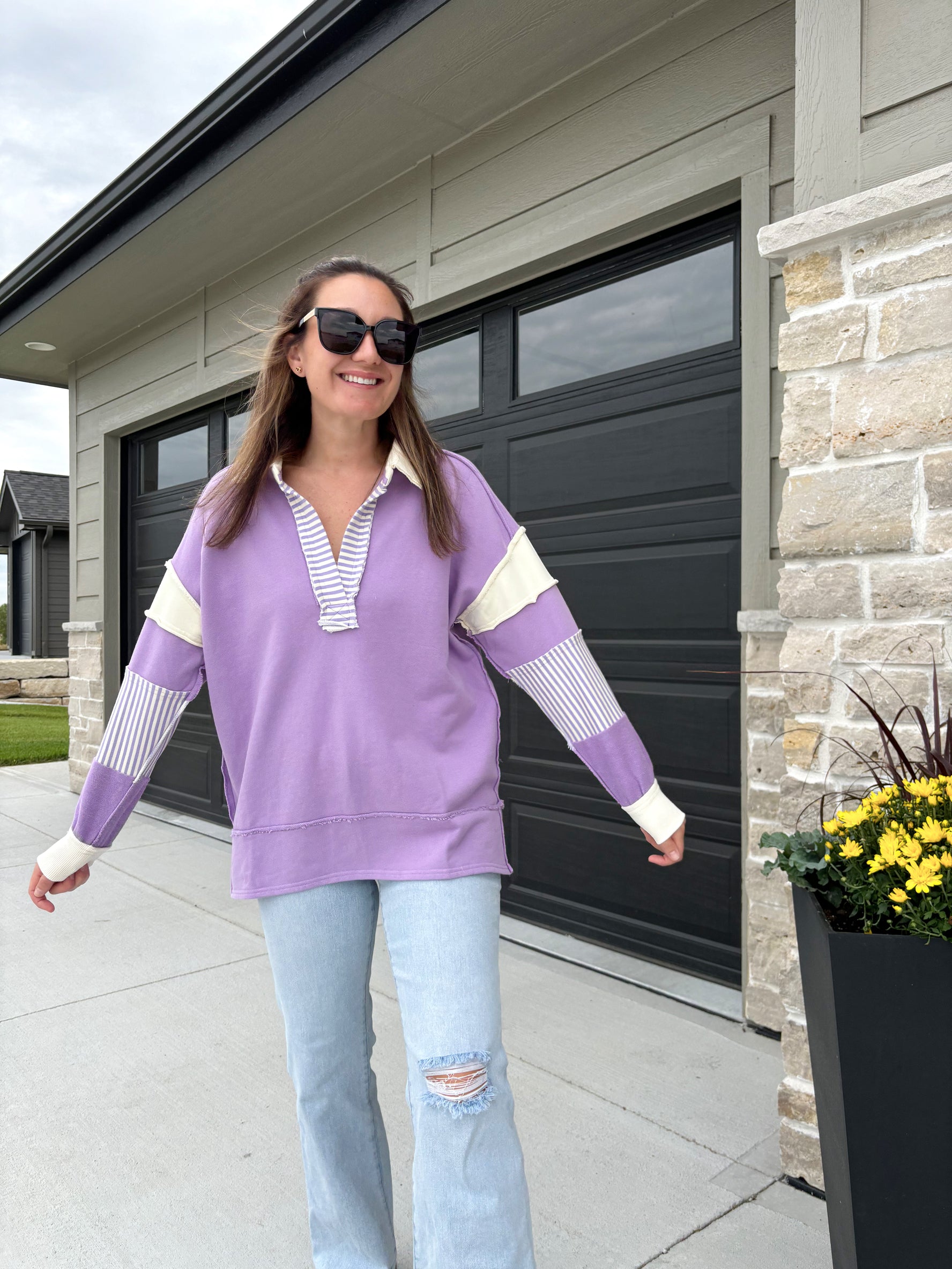 styled view of Jenness lavender and white polo sweater, cotton/poly blend, shown in size small