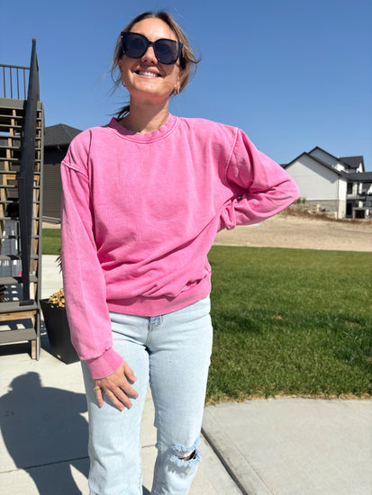 styled view of Winona plush mineral wash sweatshirt in bubblegum pink, brushed fabric, pre-shrunk, shown in size medium