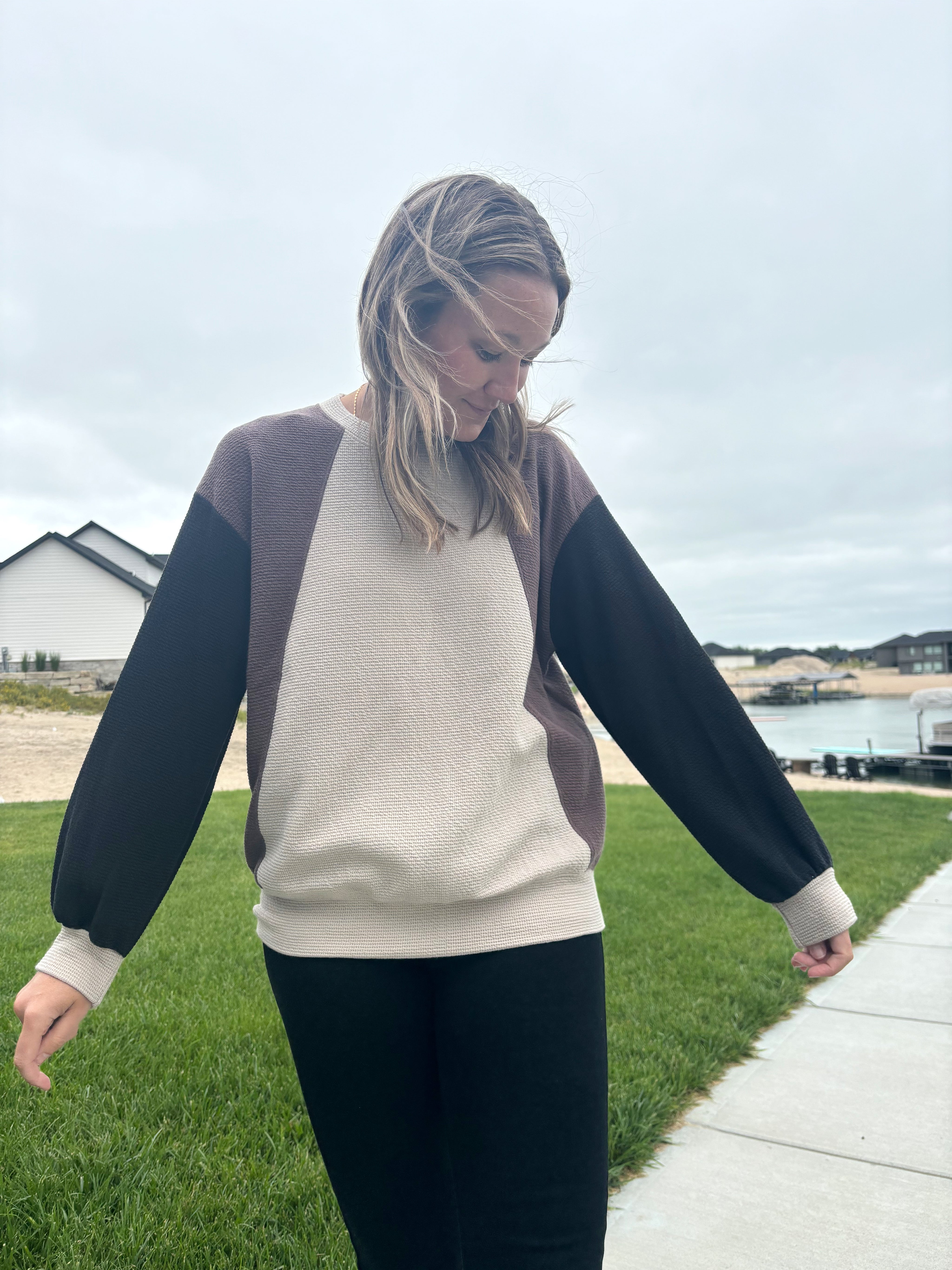 Neutral color block sweatshirt in taupe, brown, and black, poly/cotton blend, shown in size medium