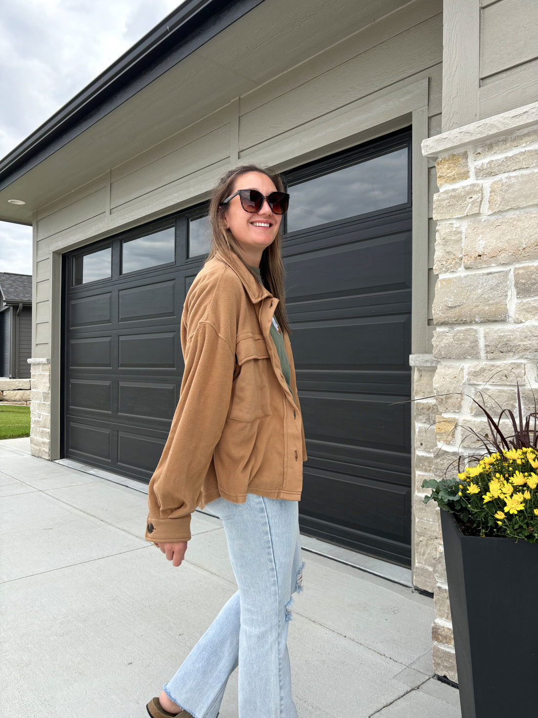 side view of Hampden loose fit button-down fleece shacket in camel, 100% polyester, shown in size small