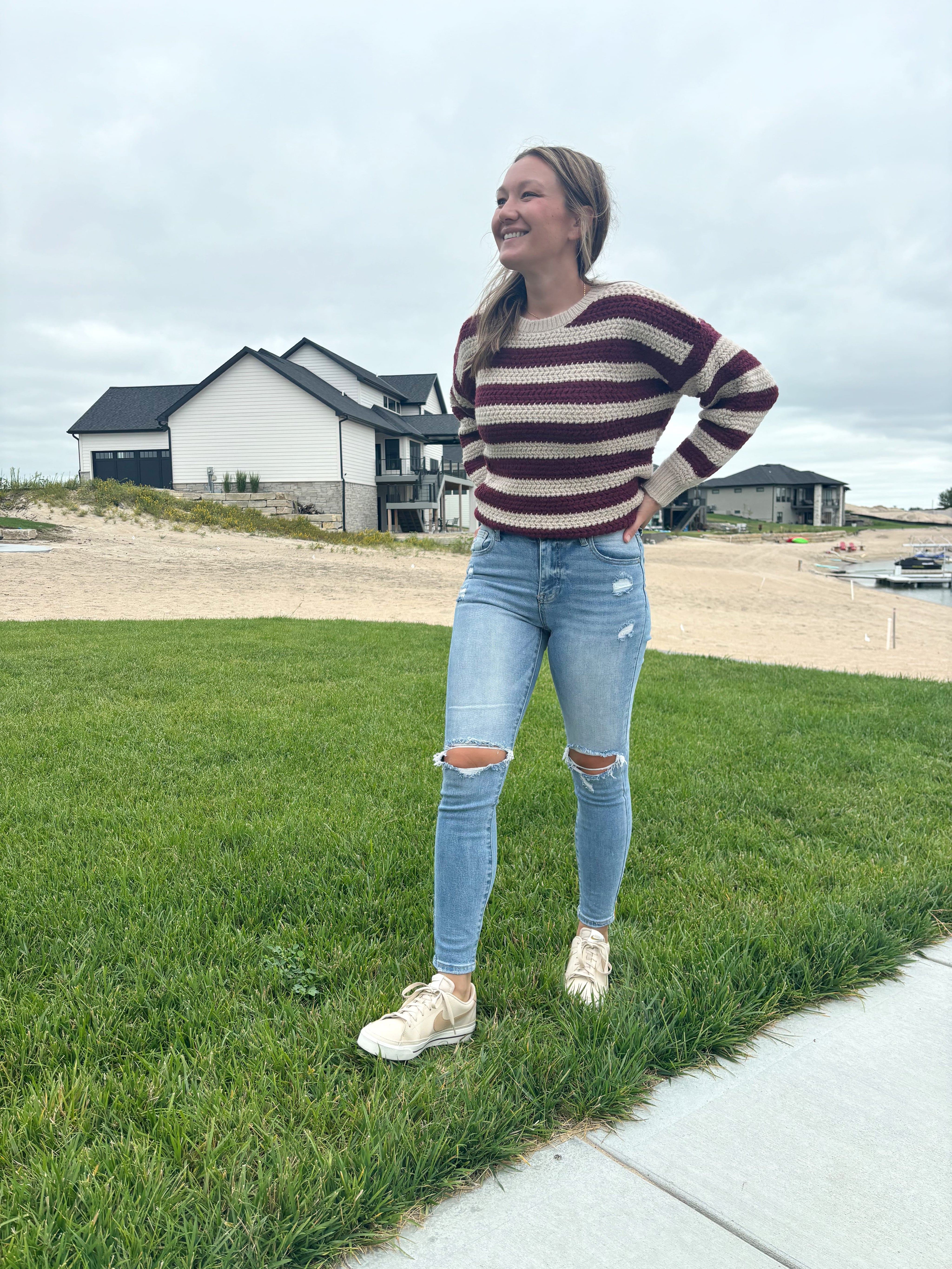 styled view of Pearl maroon and cream striped knit sweater, round crewneck, acrylic/nylon/poly blend, shown in size small