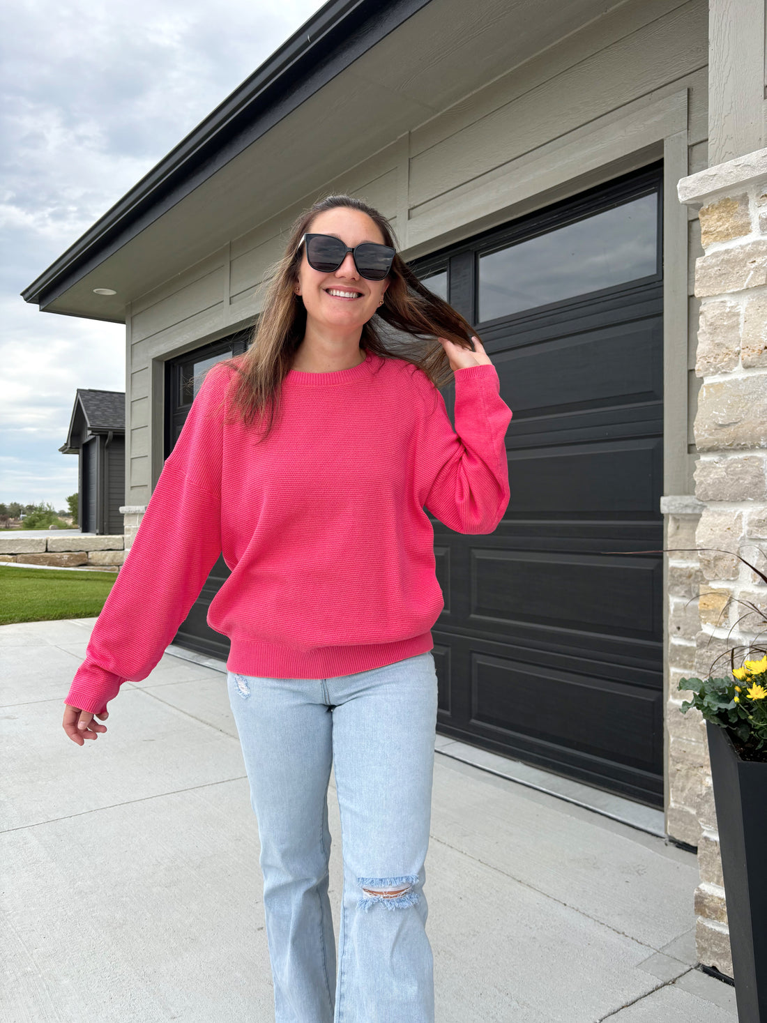 Hinston two-tone waffle knit sweater in fuchsia and coral, 100% cotton, shown in size medium