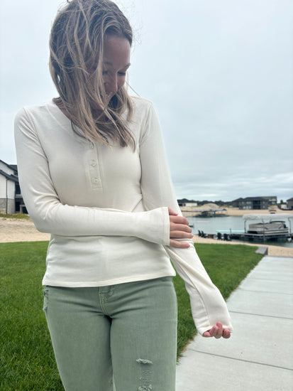 Nichols cream Henley long sleeve top, ultra-comfortable micro-modal/spandex blend, shown in size medium