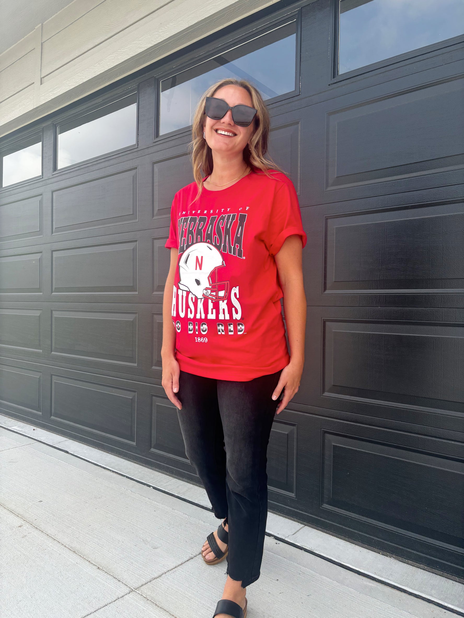 styled view of Murray Husker tee, 100% cotton, officially licensed by the University of Nebraska, shown in size medium