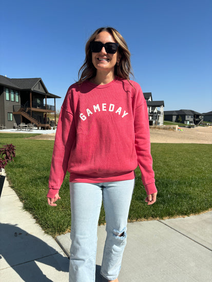 zoomed out view of Gameday sweatshirt in mineral scarlet red, brushed fabric, pre-shrunk, shown in size medium, available for oversized fit"