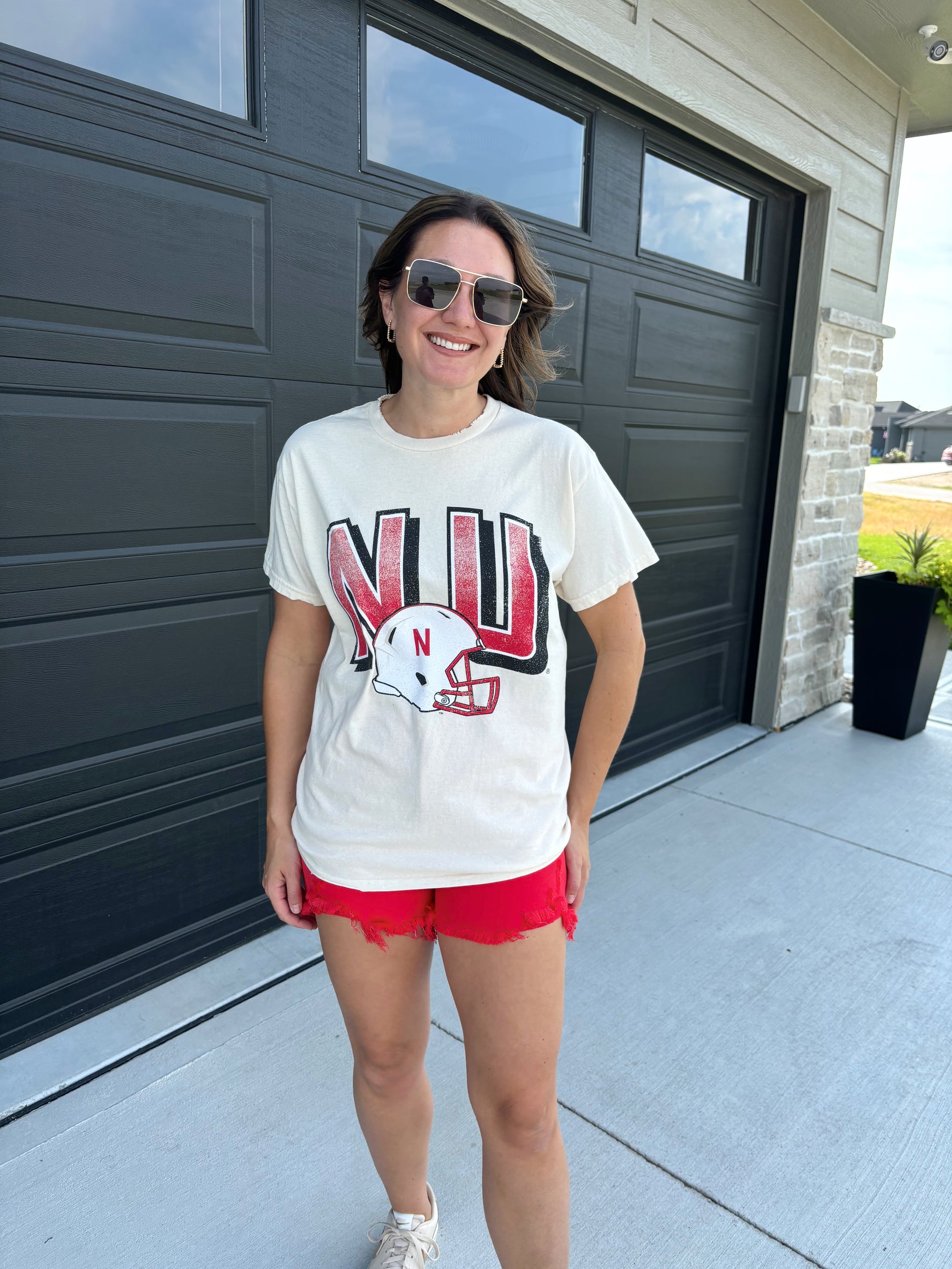 NU distressed tee, oversized fit, pre-shrunk 100% cotton, officially licensed by the University of Nebraska, shown in size small