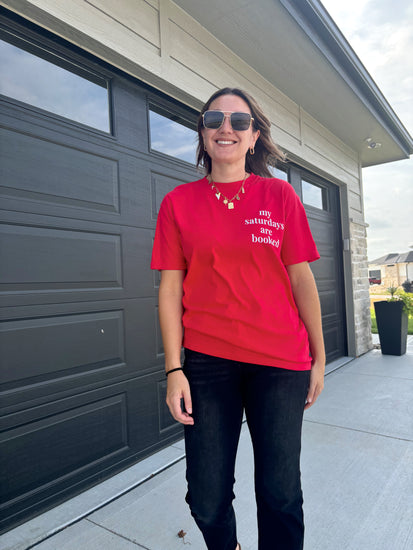 Saturday Tailgating Club red Comfort Colors tee, shown in size medium