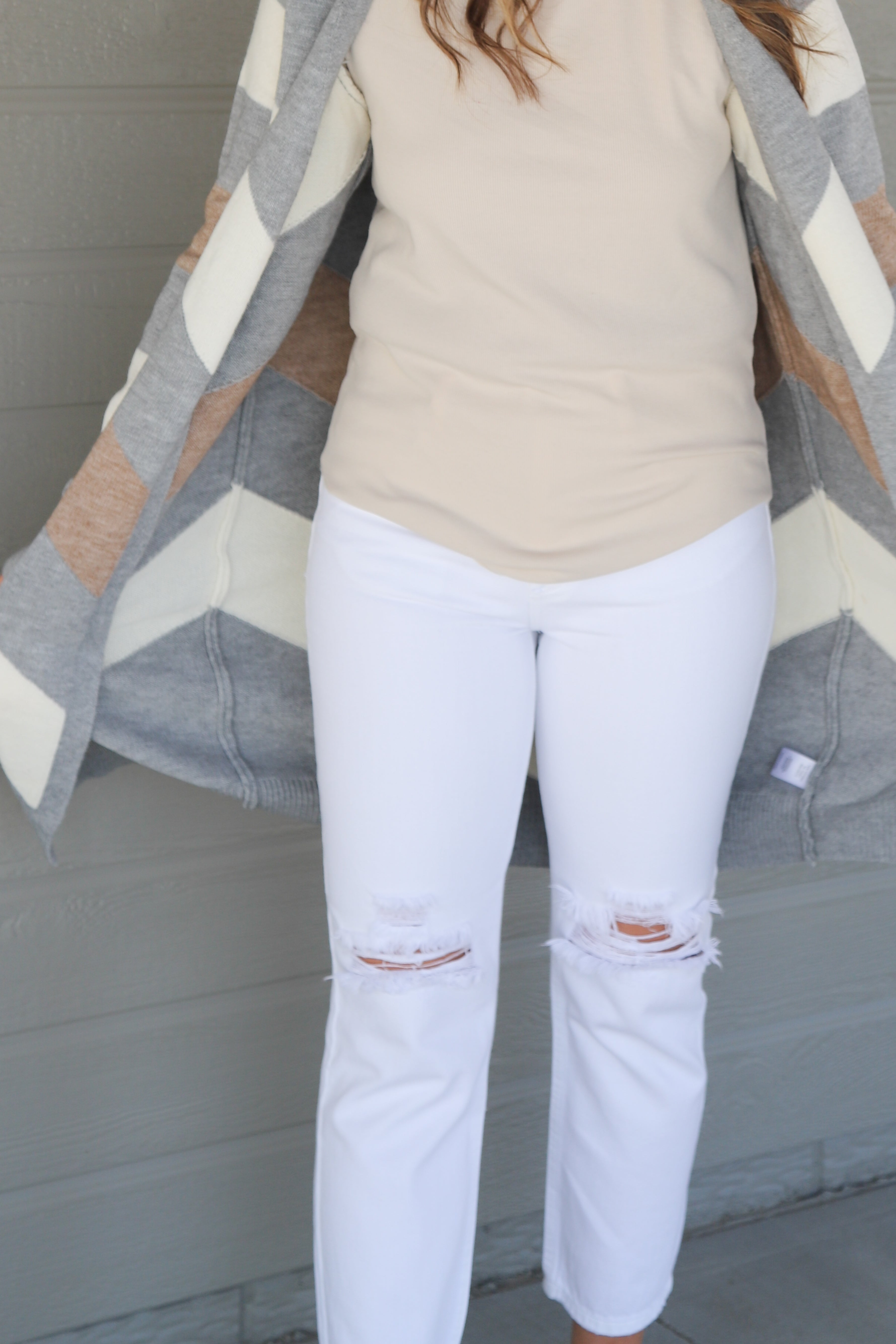 detail of Parmenter chevron sweater cardigan in heather grey and cream, neutral palette, shown in size small